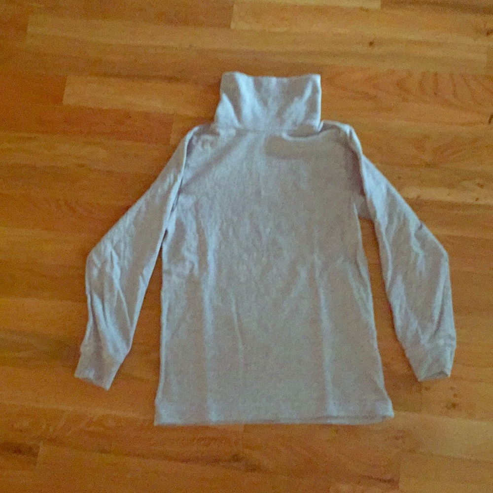 Girls, gray turtleneck.